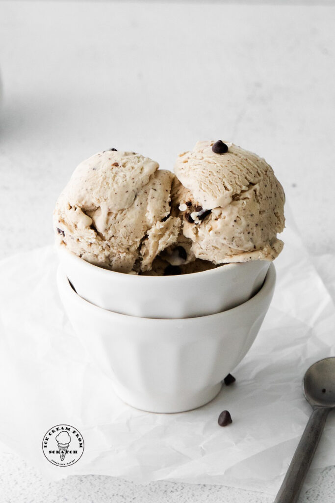 two scoops of coffee flavored ice cream in a bowl