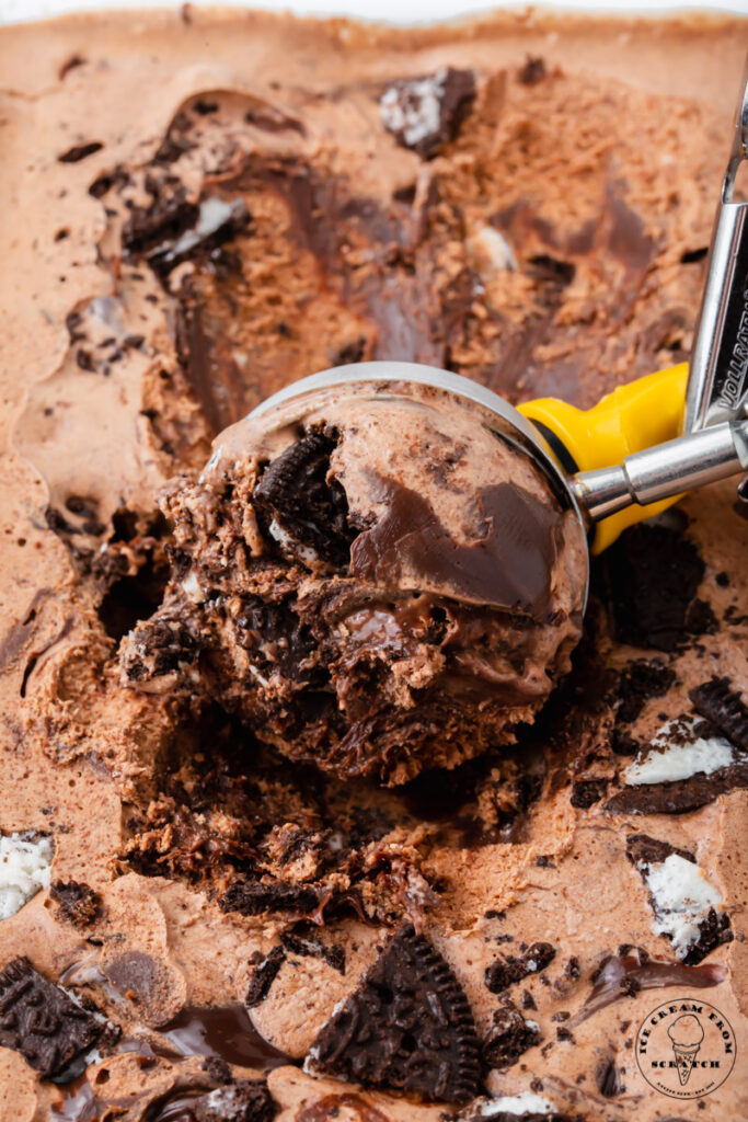 mississippi mud ice cream being scooped with a metal ice cream scoop