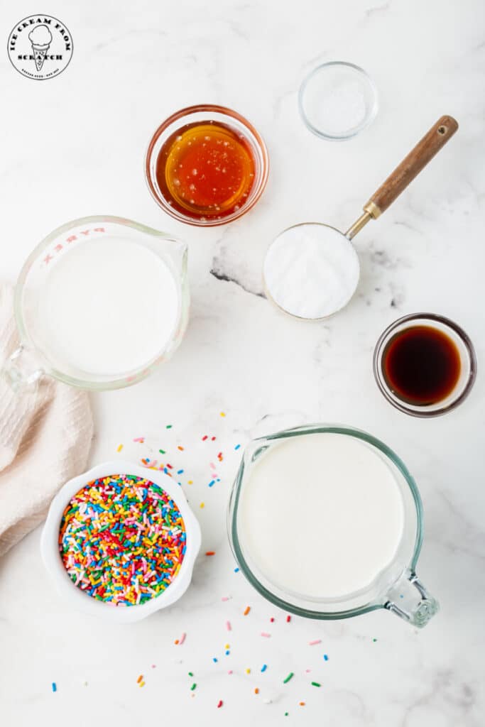 Ingredients for Sprinkles ice cream, all in separate bowls.