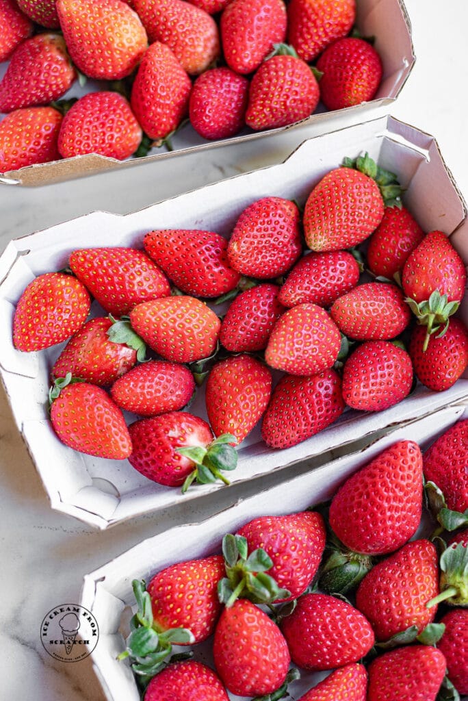 top down view of flats of strawberries