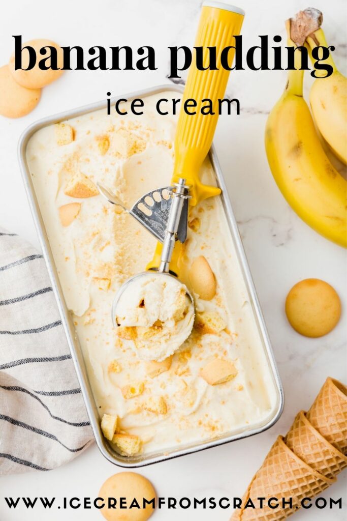 a metal pan filled with banana ice cream topped with vanilla wafers being scooped with a yellow ice cream scoop.