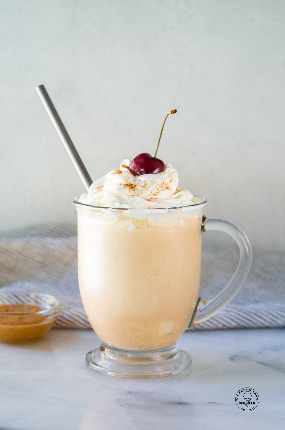 peanut butter milkshake with a cherry on top