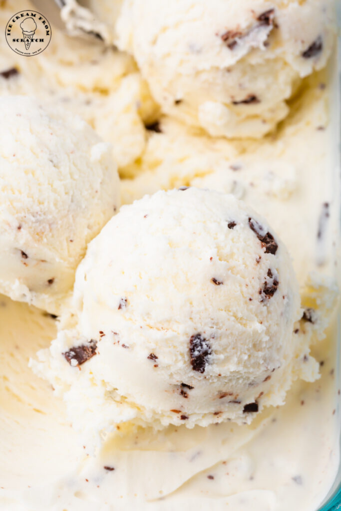 Close-up view of homemade chocolate chunk ice cream scoops.