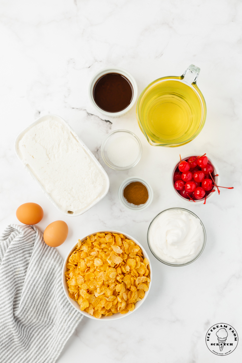Ingredients for making fried ice cream, measured and laid out on a marble counterop