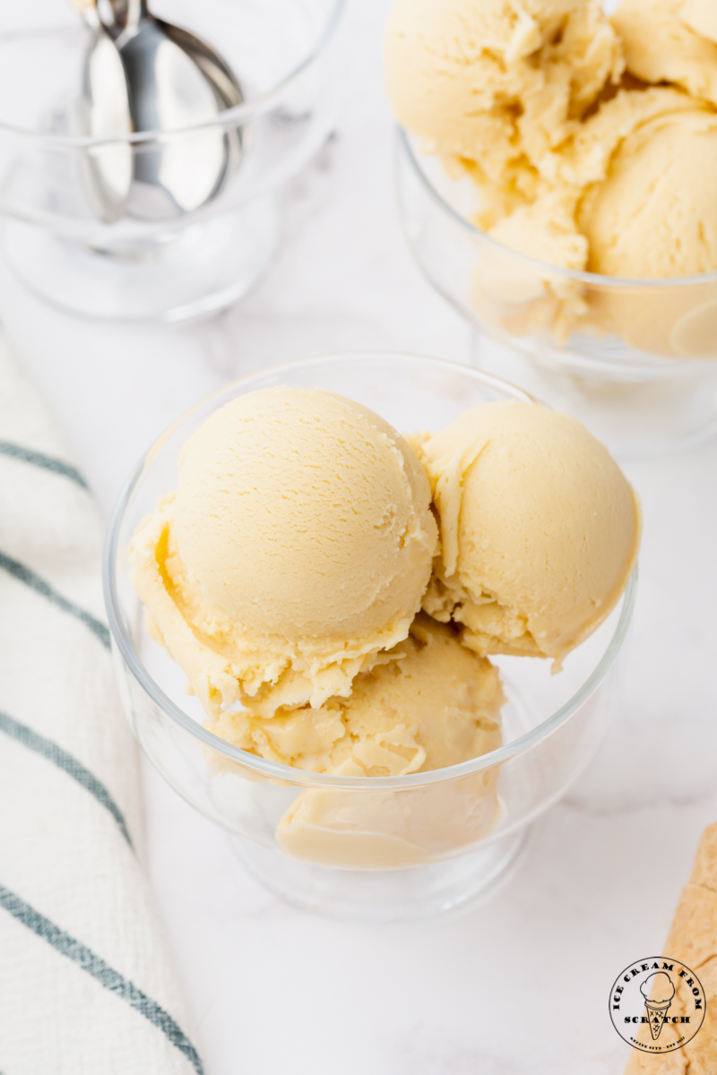 a glass dish filled with scoops of smooth, creamy, oat milk ice cream
