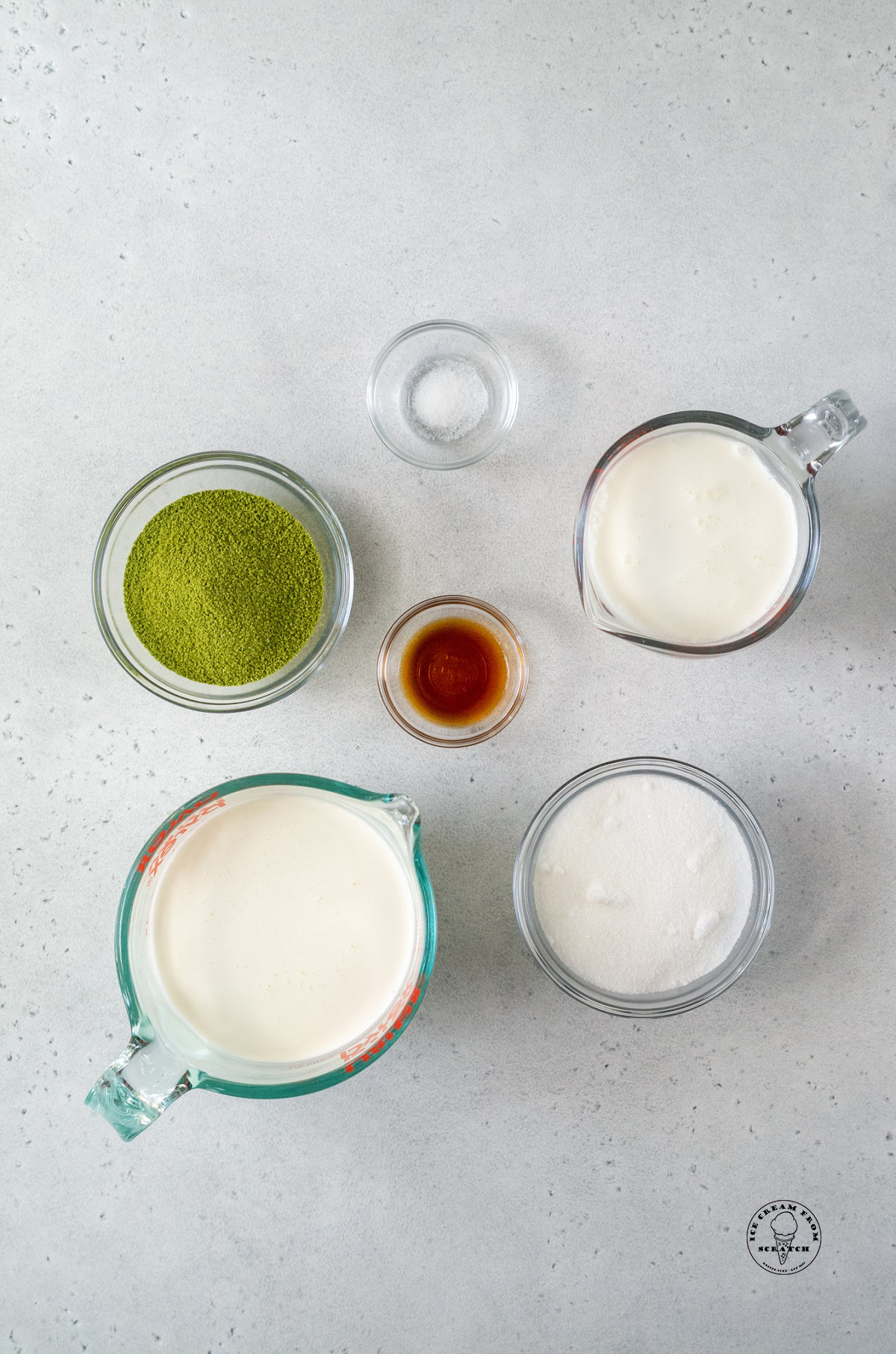 The ingredients needed for making homemade matcha ice cream.