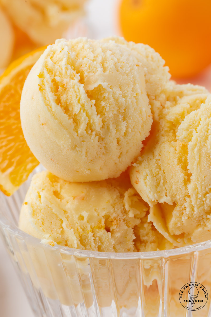 closeup view of a dish of homemade orange ice cream