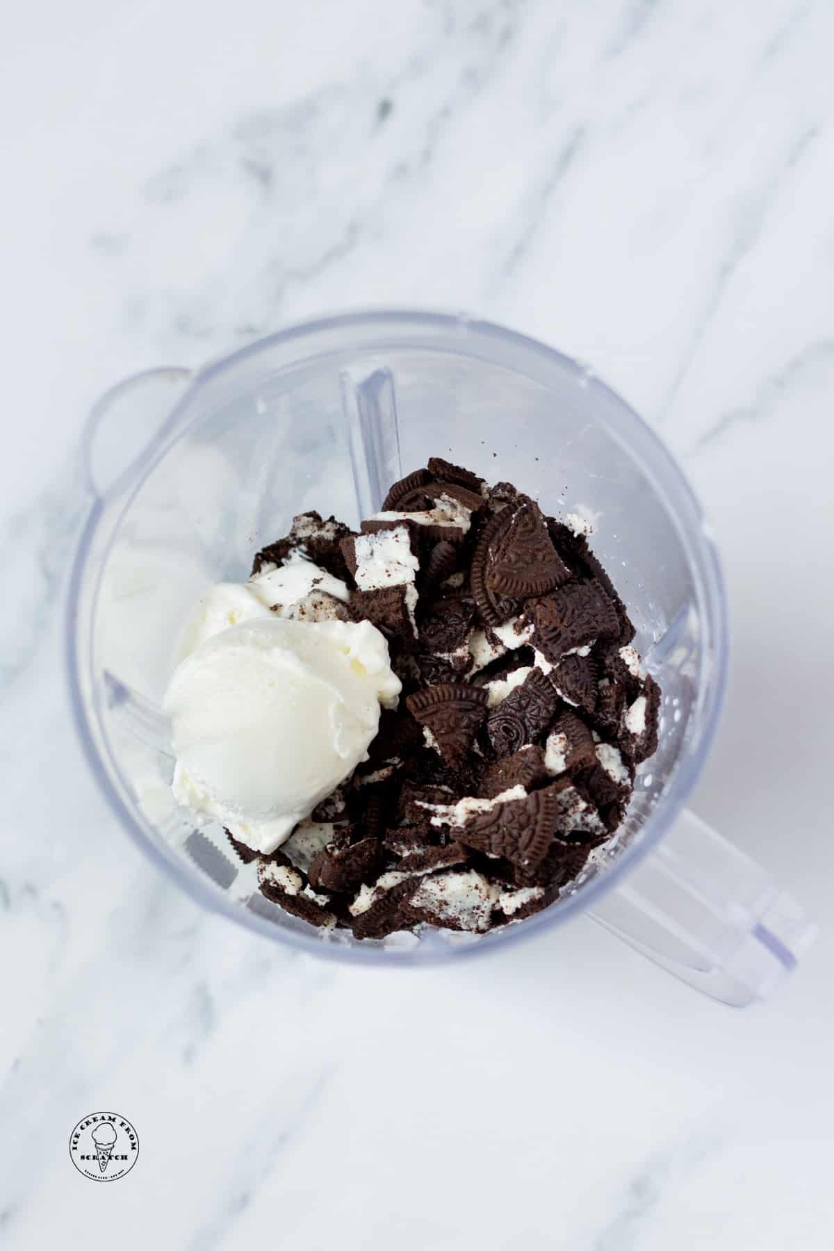 Oreos and ice cream in a blender with milk.