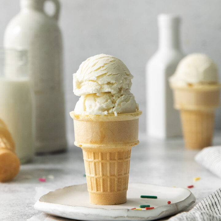 a sugar cone filled with scoops of sugar free vanilla ice cream.