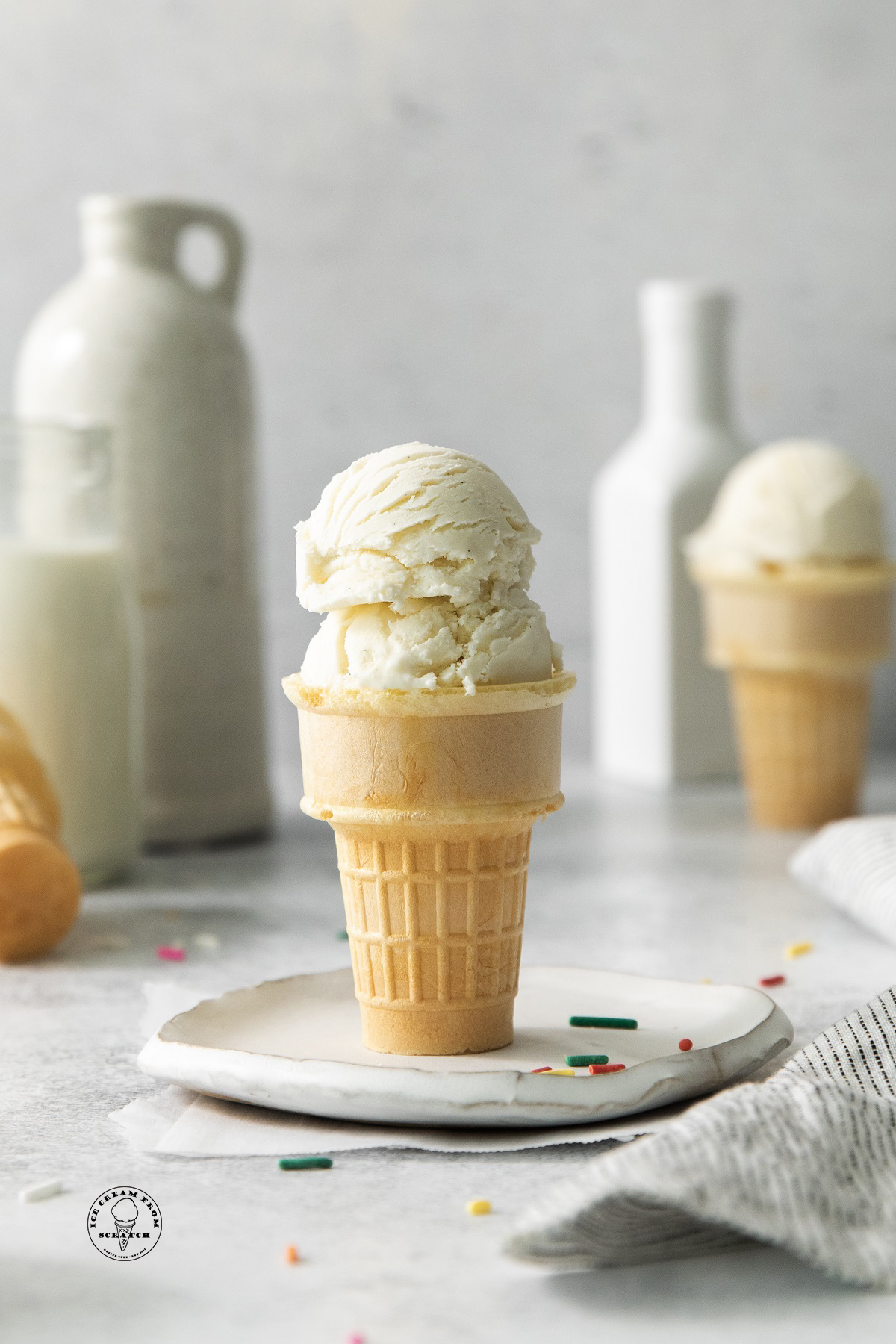 a sugar cone filled with scoops of sugar free vanilla ice cream.