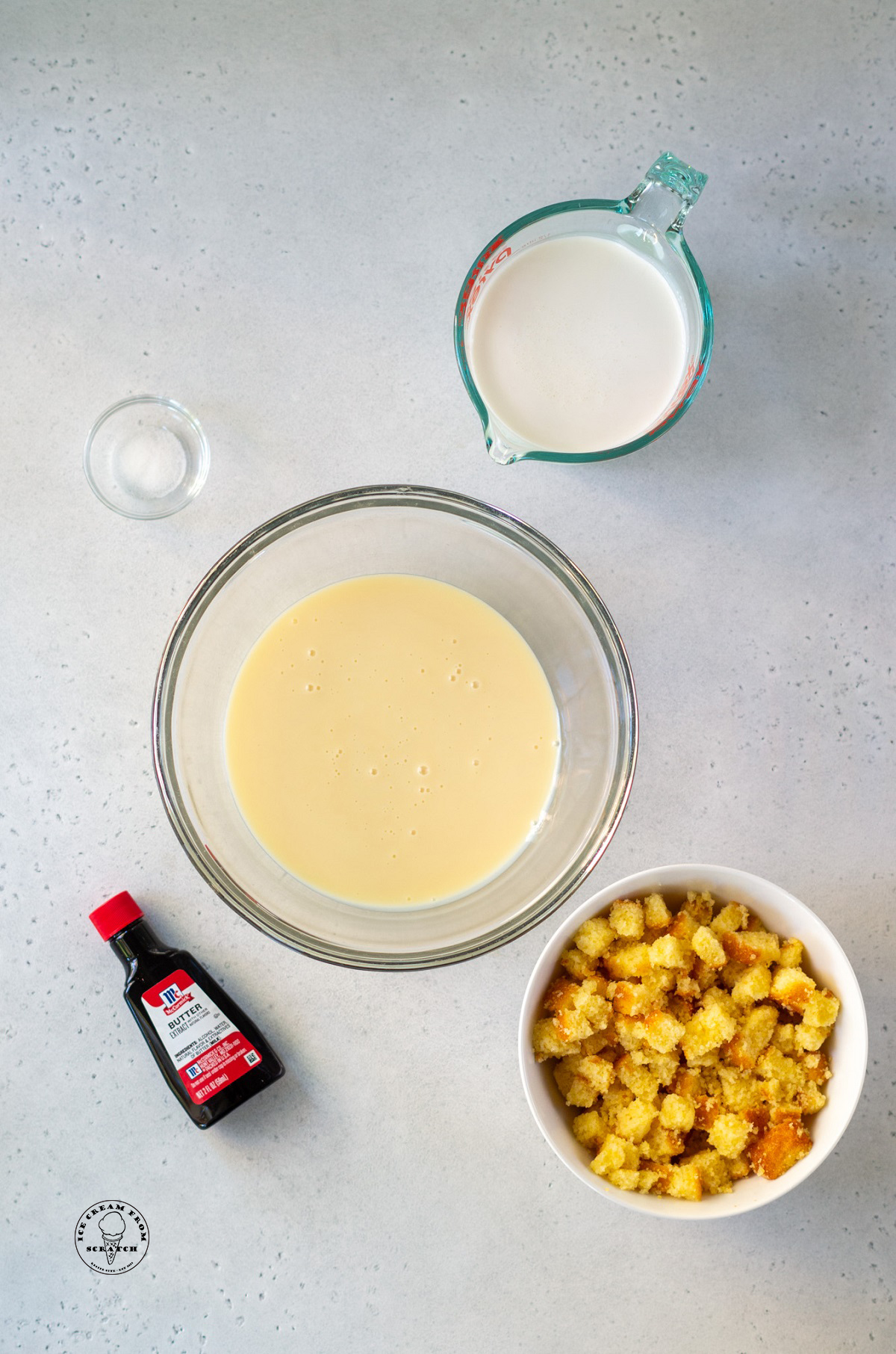 The 5 ingredients needed to make no churn cornbread ice cream with sweetened condensed milk and butter extract.