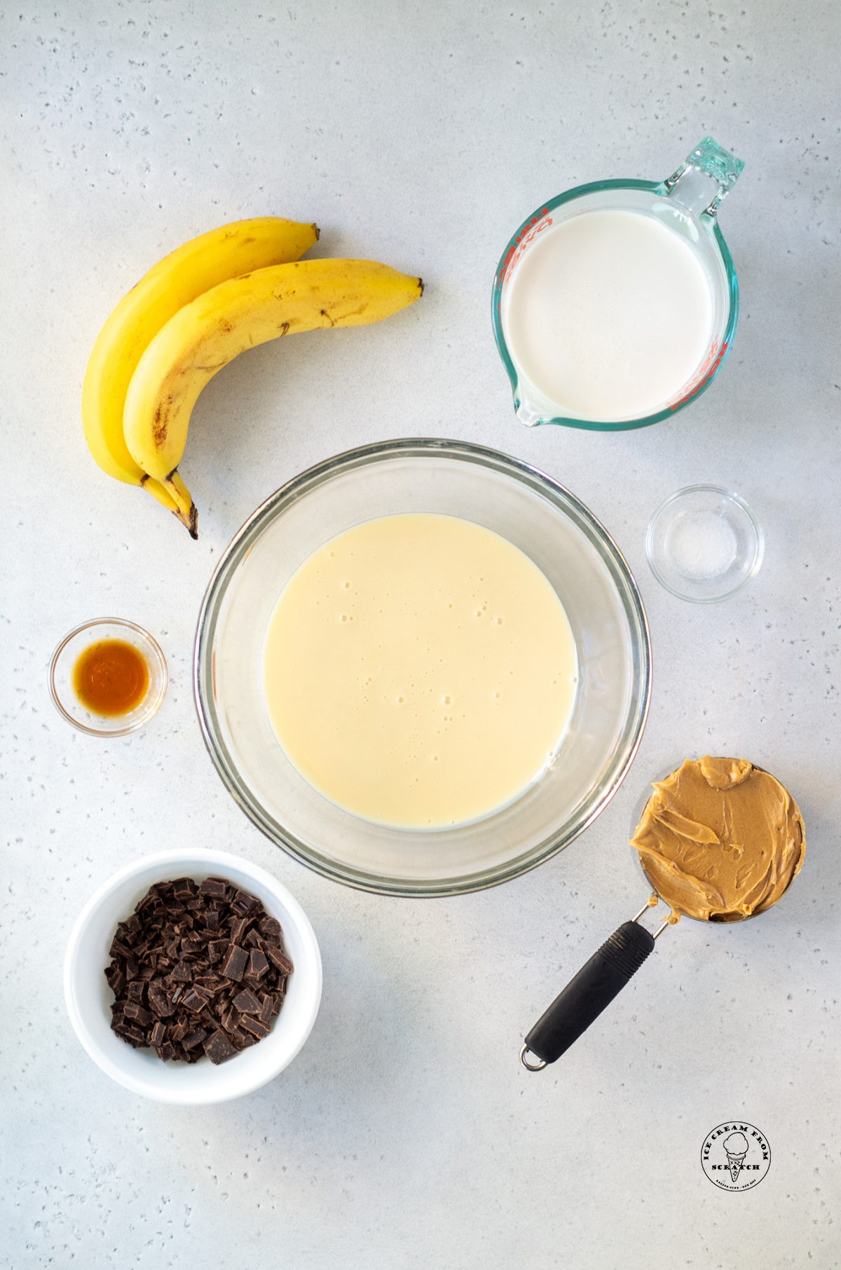 The ingredients needed to make no churn fat elvis ice cream with peanut butter, chocolate, and banana