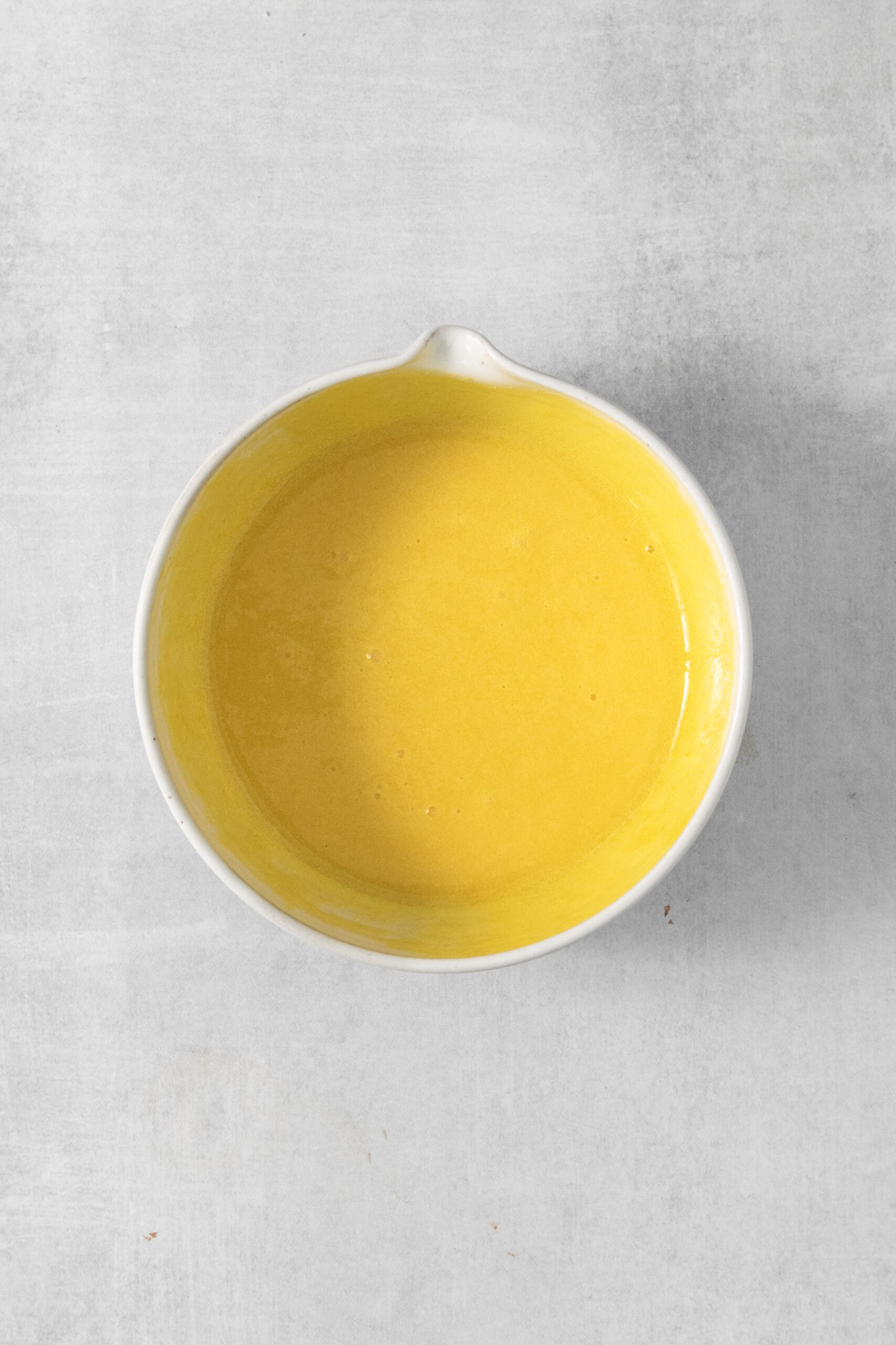 egg yolks and sugar mixed in a bowl