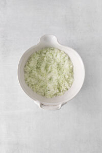 lime zest and sugar mixed in a bowl