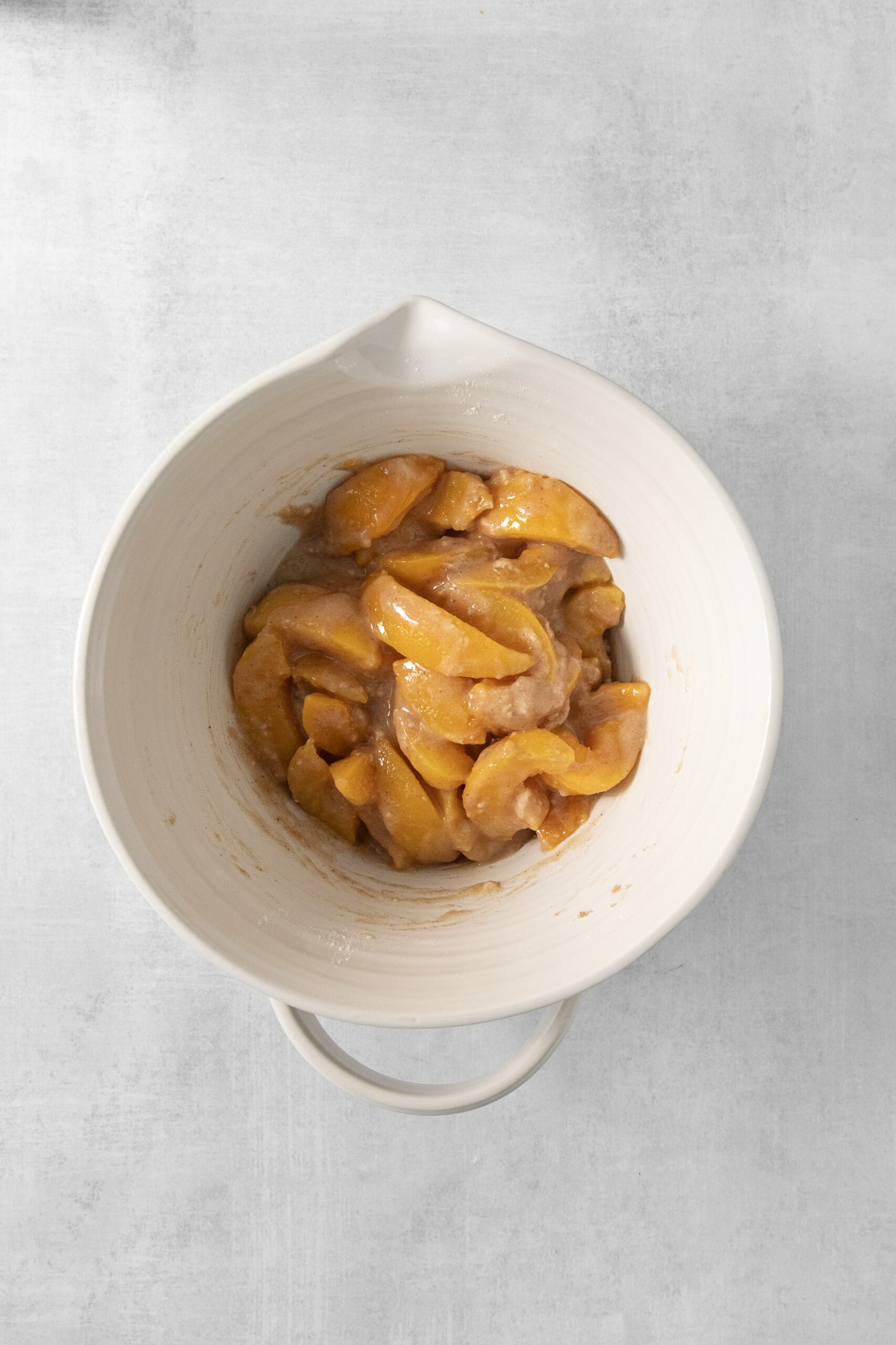peach filling and sugar in a mixing bowl